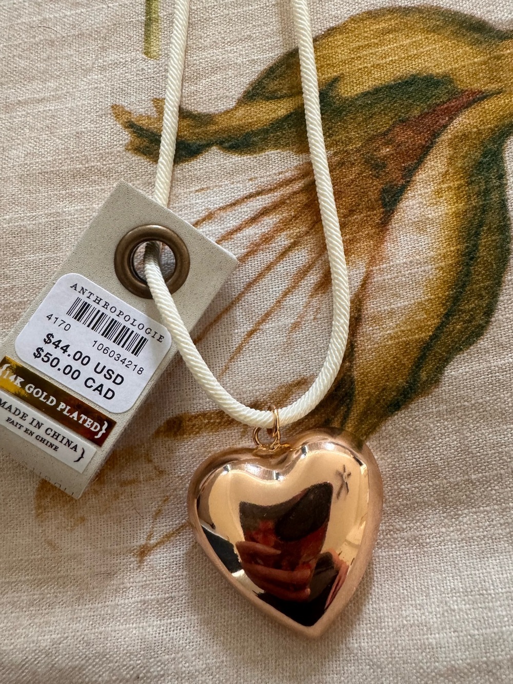 Anthropologie Shiny Rose Gold Heart Pendant on Cream Cord